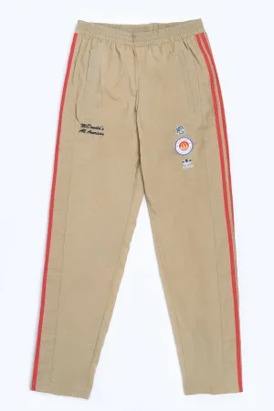 ADIDAS X ERIC EMANUEL MCDAA SNAP PANT COLLEGIATE GOLD