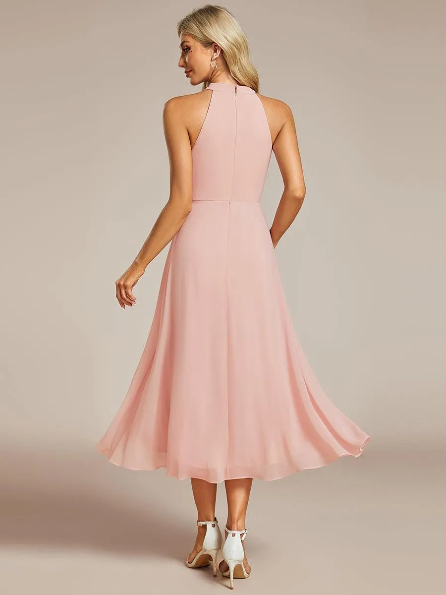Robe d'invité de mariage mi-longue sans manches et col licou en mousseline de soie